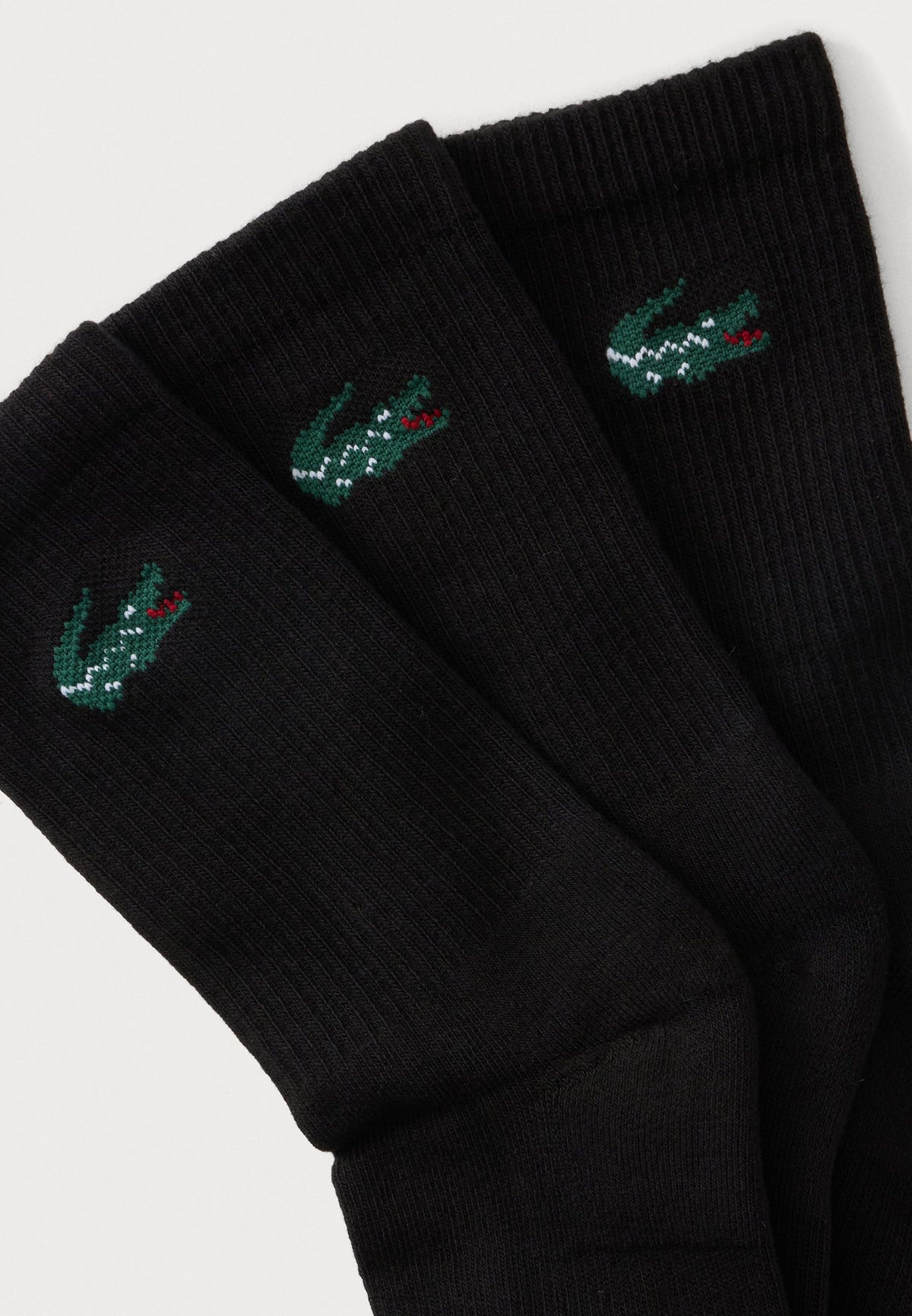 LACOSTE 3 PACK CREW SOCKS IN BLACK B46599