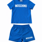 MOSCHINO BOYS BLUE SWIM SHORTS/T SHIRT SET HUM05U/HUL01K