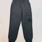 C.P.COMPANY BOYS DARK GREY JOGGING BOTTOMS COP002