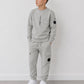 C.P. COMPANY LENS LOGO TRACKSUIT IN FLINT GREY CUK009